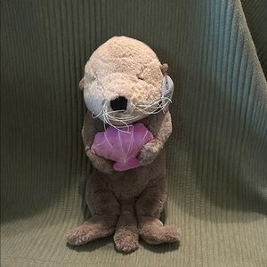 Adorable Plush Otter with Pink Heart